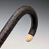Antique British bone decorated curved handle leather wrapped iron shaft walking stick 89cm